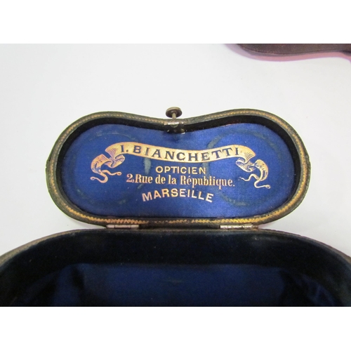 1220 - A Victorian shaped christening egg cup and spoon fitted silk lined box, I. Bianchetti optician opera... 