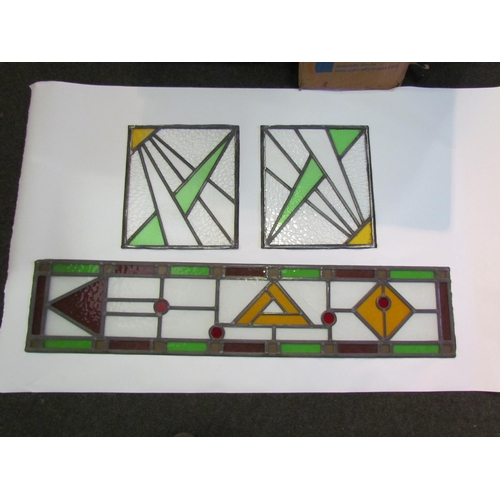 1223 - Three stained glass panels, one a/f, one 120cm long x 26cm wide and two 38cm x 34cm