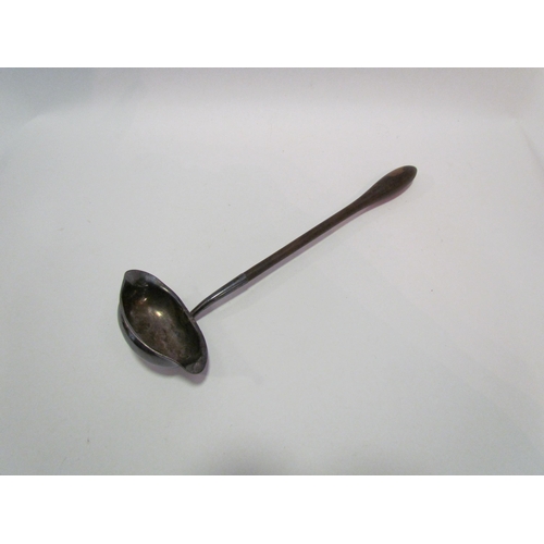 1226 - A twin spout metal ladel with turned handle and crest