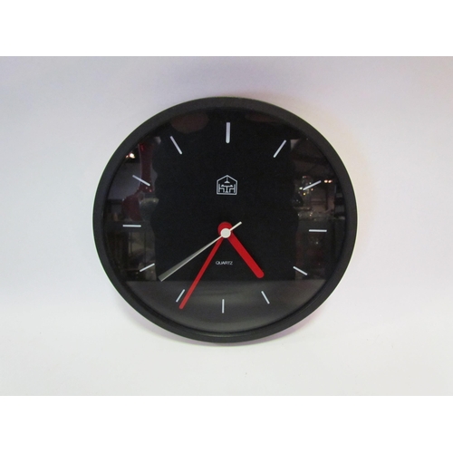 1232 - A circa 1980's Habitat battery operated wall clock, 21cm diameter