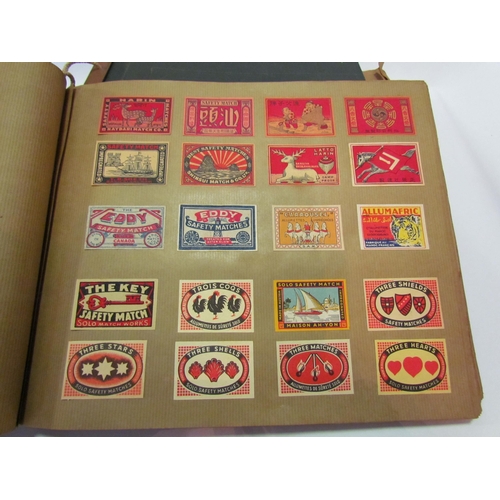 5127 - Three albums of match box covers to include early 20thc examples, Japanese, Russian and Continental ... 