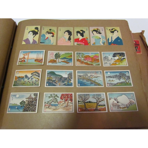 5127 - Three albums of match box covers to include early 20thc examples, Japanese, Russian and Continental ... 