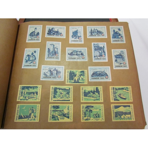 5127 - Three albums of match box covers to include early 20thc examples, Japanese, Russian and Continental ... 