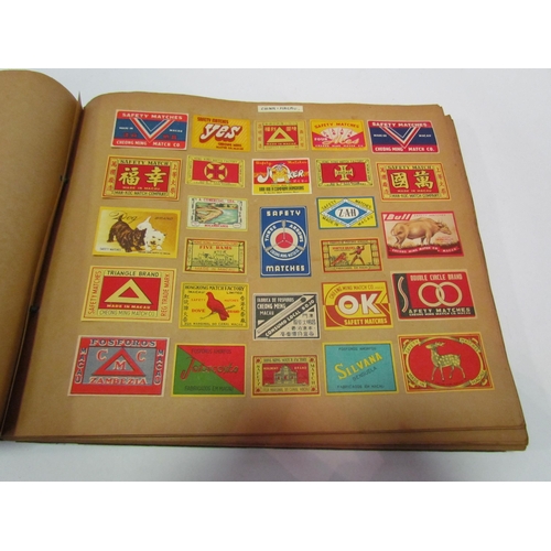 5127 - Three albums of match box covers to include early 20thc examples, Japanese, Russian and Continental ... 