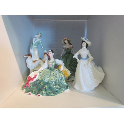 1378 - A collection of four Royal Doulton ladies to include 