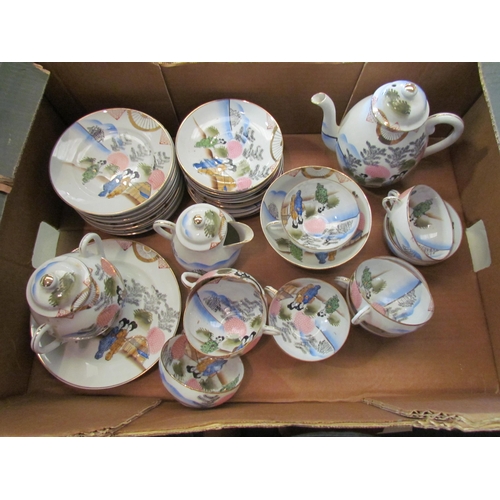 1398 - A 20th Century Japanese egg shell porcelain part tea set