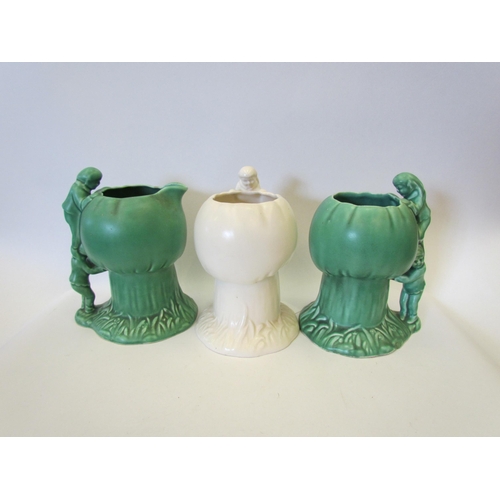 1442 - A pair of Sylvac green glazed jugs with pixie handles and a similar cream glazed vase (3)