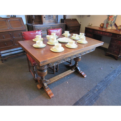 1023 - A 1940's oak refectory style dining table with draw-leaves, 77cm tall x 122cm long x 76cm wide not i... 