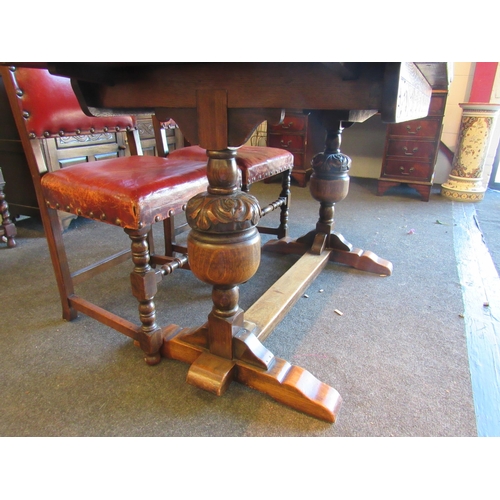 1023 - A 1940's oak refectory style dining table with draw-leaves, 77cm tall x 122cm long x 76cm wide not i... 