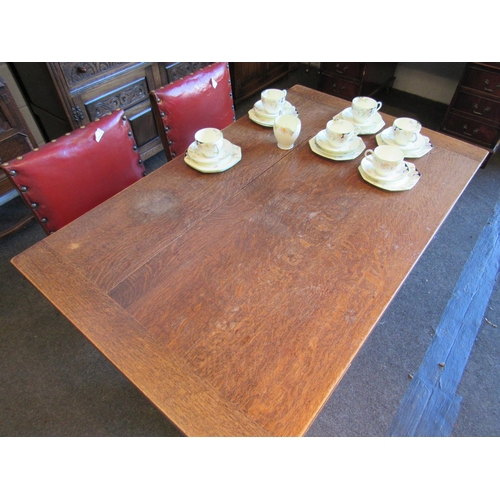 1023 - A 1940's oak refectory style dining table with draw-leaves, 77cm tall x 122cm long x 76cm wide not i... 