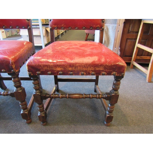 1024 - A set of four 1940's oak framed Cromwellian style dining chairs, studded upholstery