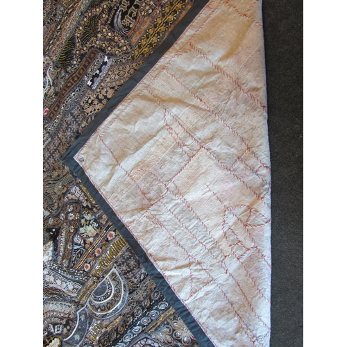 1105 - A large ornate hand sewn vintage Indian tapestry, 255cm x 205cm