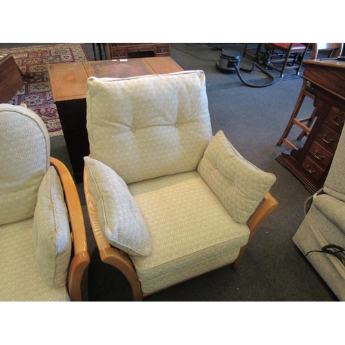 1132 - An Ercol two seater sofa and matching chair