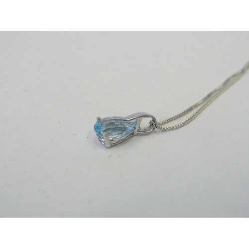 1259 - A 9ct white gold chain hung with an aquamarine pendant, 2g   (C)