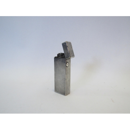 1310 - A Dunhill silver plated lighter