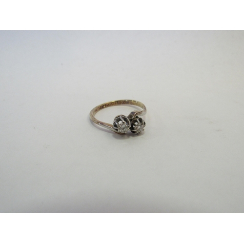 1314 - A two stone diamond crossover ring, stamped 18ct/plat. Size M/N, 2.8g  (C)