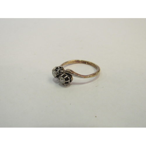 1314 - A two stone diamond crossover ring, stamped 18ct/plat. Size M/N, 2.8g  (C)