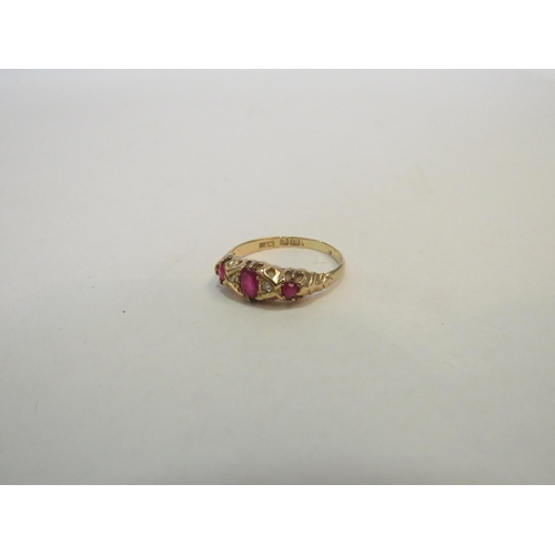 1316 - A gold ruby and diamond ring, stamped 18ct. Size Q/R, 2.3g  (C)