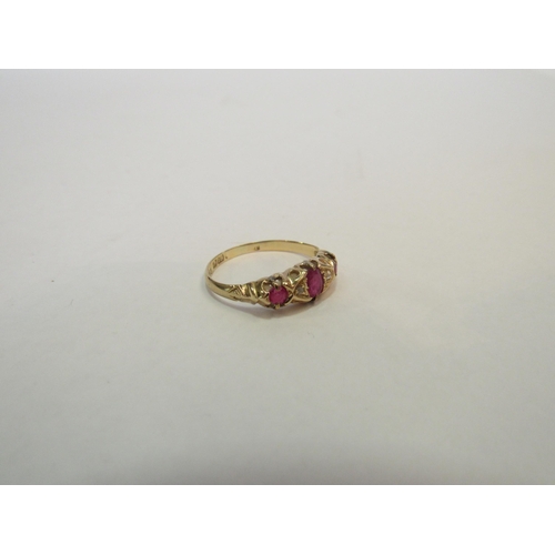 1316 - A gold ruby and diamond ring, stamped 18ct. Size Q/R, 2.3g  (C)