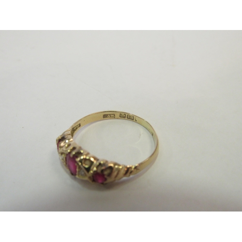 1316 - A gold ruby and diamond ring, stamped 18ct. Size Q/R, 2.3g  (C)