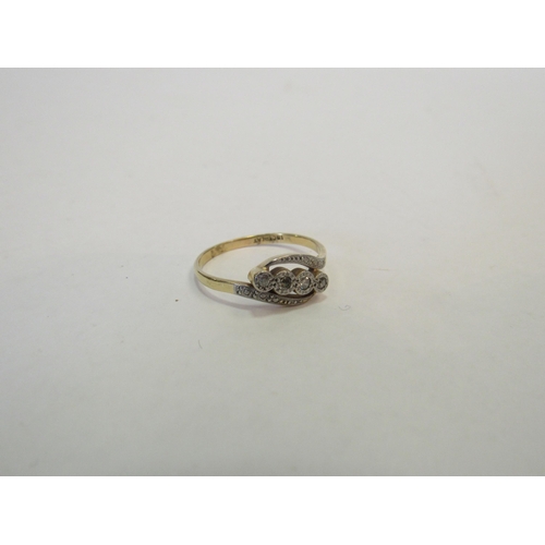 1318 - An 18ct gold diamond ring