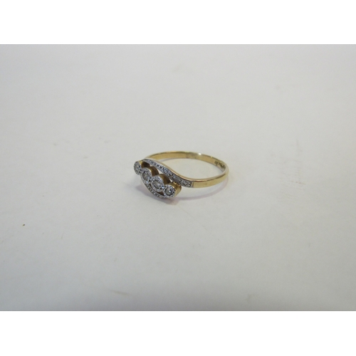 1318 - An 18ct gold diamond ring