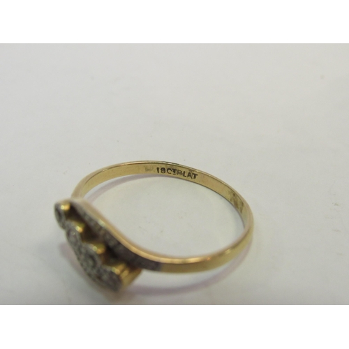 1318 - An 18ct gold diamond ring