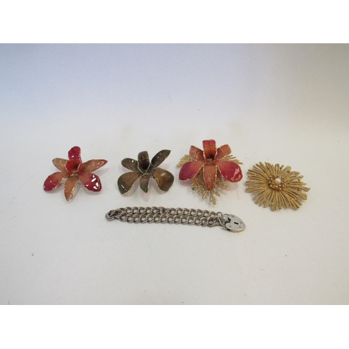 1322A - A silver compact, lighter, bracelet and Orchid brooches