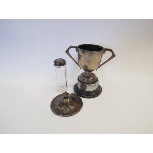 1327 - A silver trophy, a silver lid and a silver lidded dressing table pot (3)