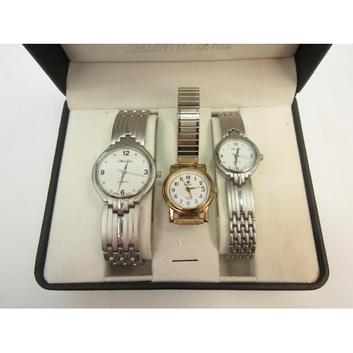 1330 - Three lady's fashion watches and an Anna Smith purse  (E)  £10-20