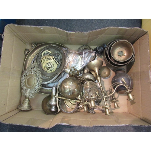 1464 - A box of brass wares including candelabra, trays, Indian brass altar etc.