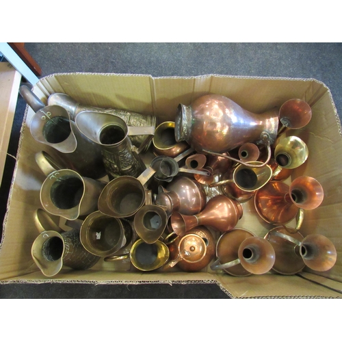 1467 - A box of copper and brass jugs