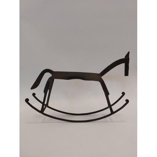 1013 - A folk art style wrought iron rocking horse