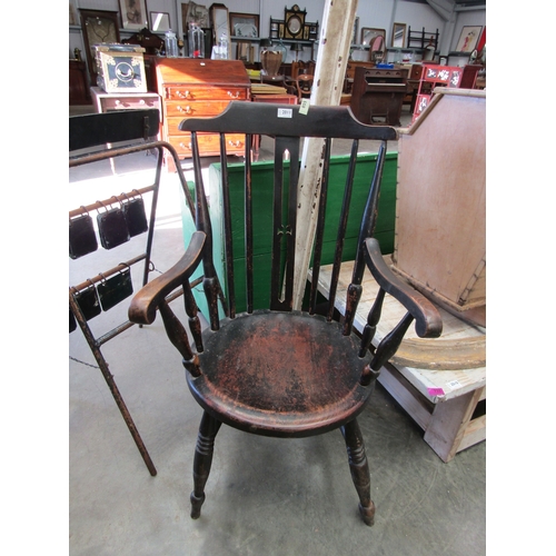 2011 - A Victorian stick back kitchen chair carved motif to centre rail