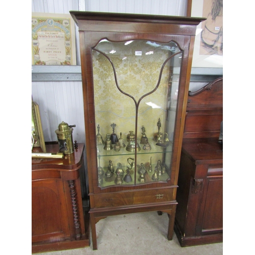 2104 - An Edwardian mahogany glazed display cabinet with glass shelved interior