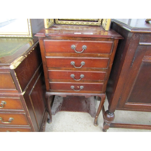 2114 - An Edwardian mahogany four drawer music cabinet cabriole legs lower tier