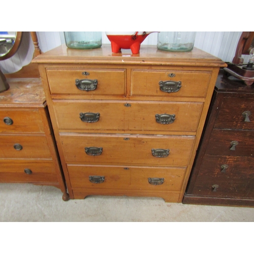 2130 - An Edwardian satinwood two over three chest of drawers