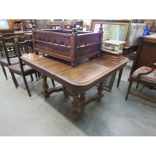 2166 - A French walnut extending dining table