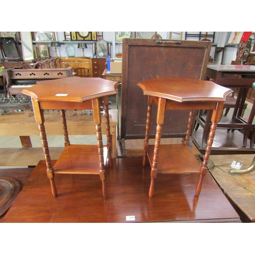 2205 - A pair of mahogany two tier side tables