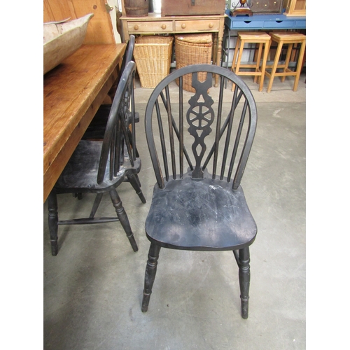 2247 - Six black painted wheel-back chairs