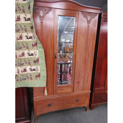 2302 - An Edwardian satinwood wardrobe shaped cornice, single drawer base