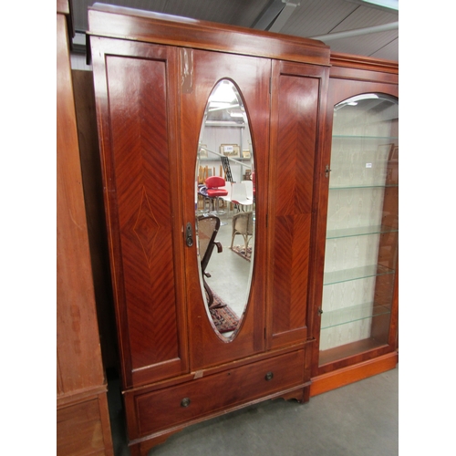 2303 - An Edwardian mahogany single door wardrobe