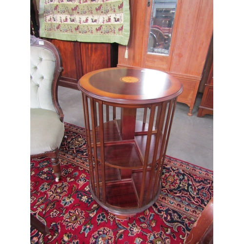 2308 - A reproduction inlaid circular revolving book case