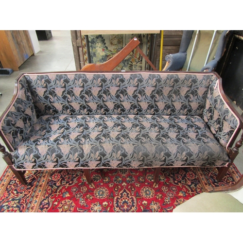 2311 - A 19th Century mahogany framed eight leg sofa   (E)  £20-30