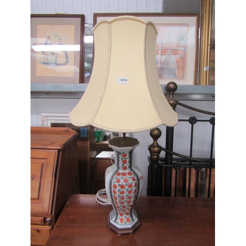 2334 - An oriental table lamp and shade