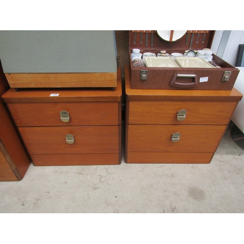 2361 - A pair of Stag bedside cabinets two drawer, plinth base