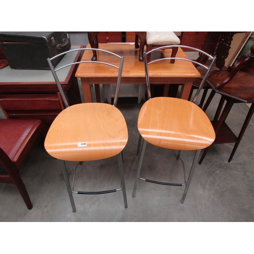 2380 - A pair of modern beech and chrome bar stools