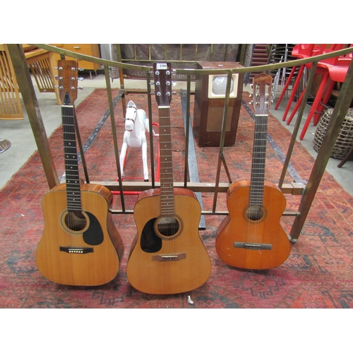 2388 - Three guitars including a left handled