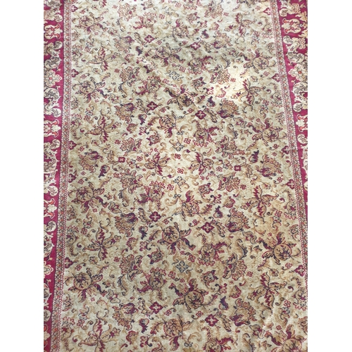 2319 - A red and brown rug 172 x 248cm   (E)  £8-12