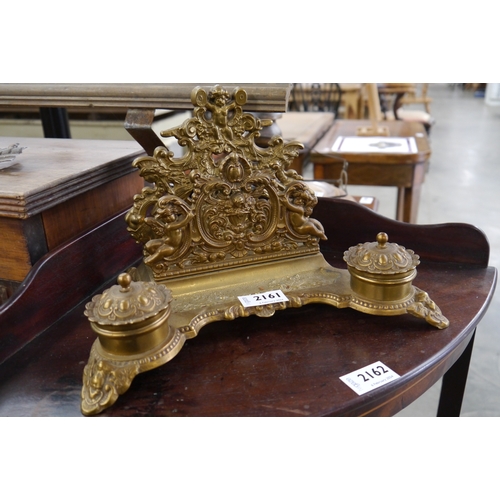 2161 - A brass letter rack desk stand and Victorian set of letter scales